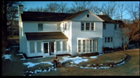 Frame grab of the film's final shot--long shot of the Jarrett house.