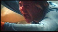 Frame grab of Conrad's nightmare. He shouts at his brother.